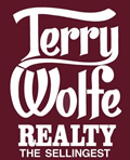 Terry Wolfe Realty Logo